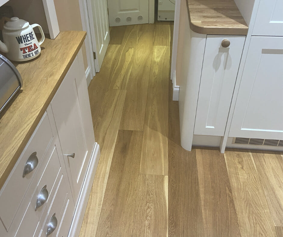 When can I put furniture back on a refinished wood floor?