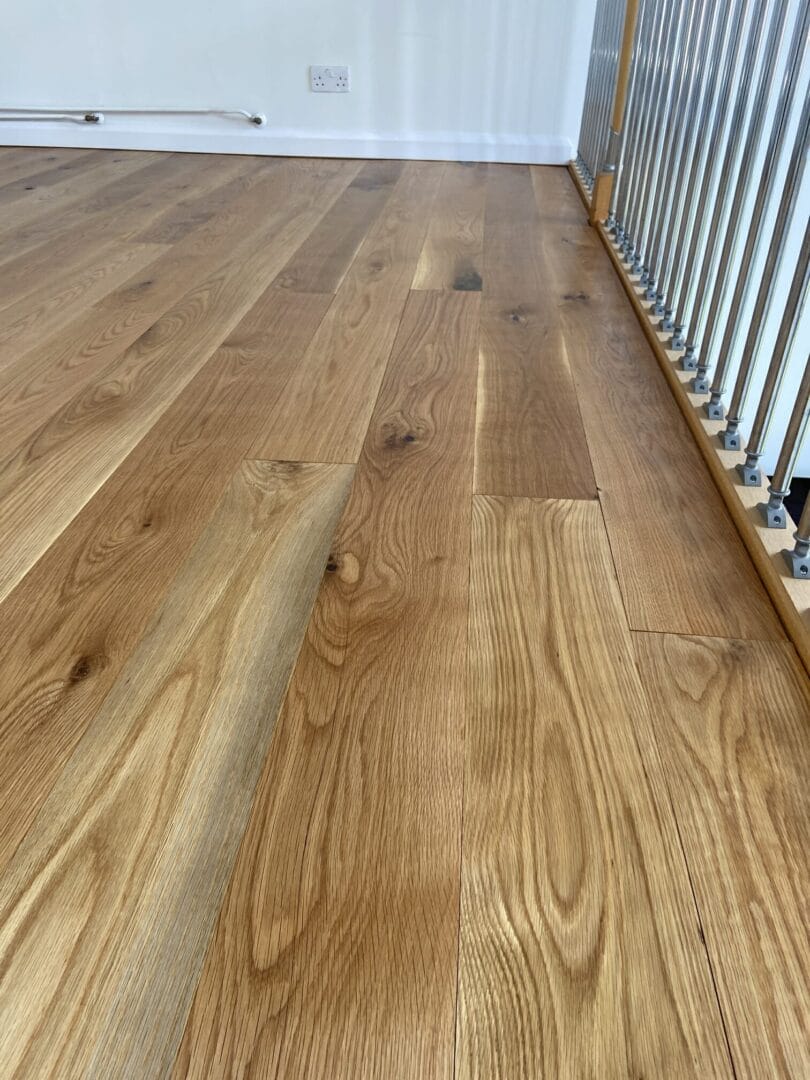 How can I refinish my wood floors without sanding?